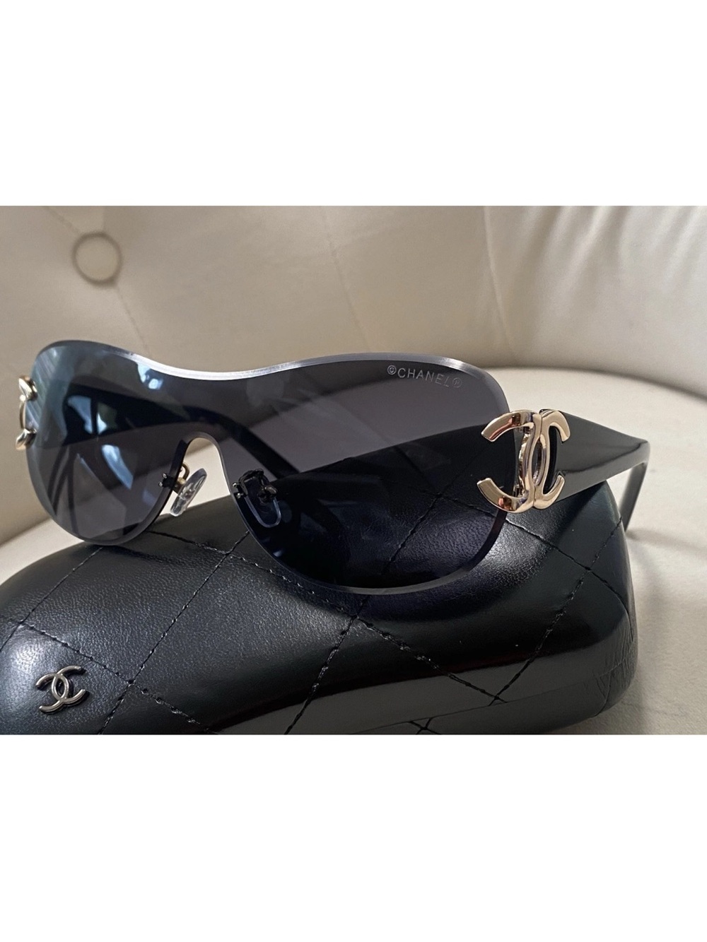 CHANEL Black Shield Sunglasses with Gold CC Emblems